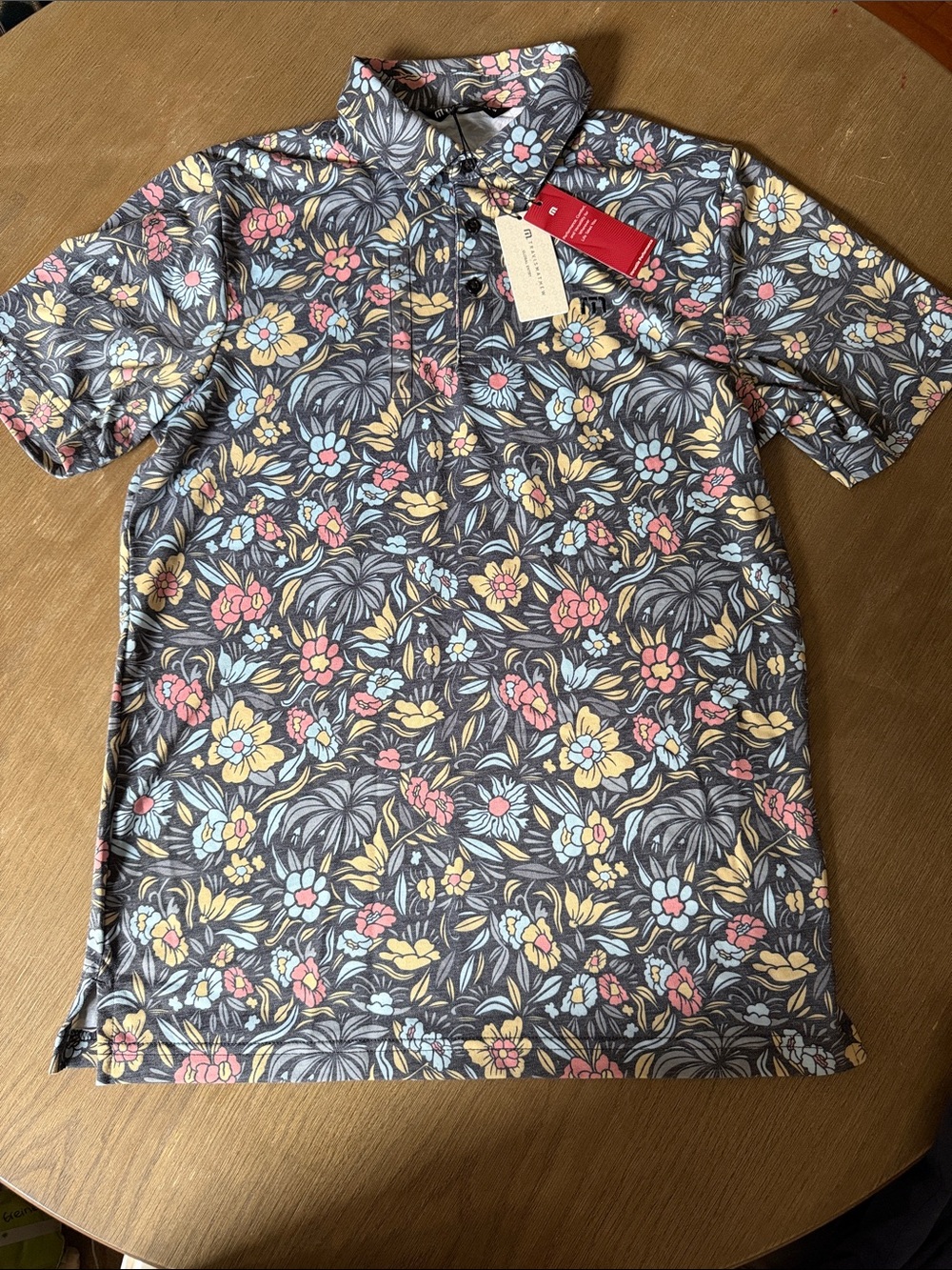 Travis Mathew Floral Polo in Gray with Blue, Pink & Yellow Accents